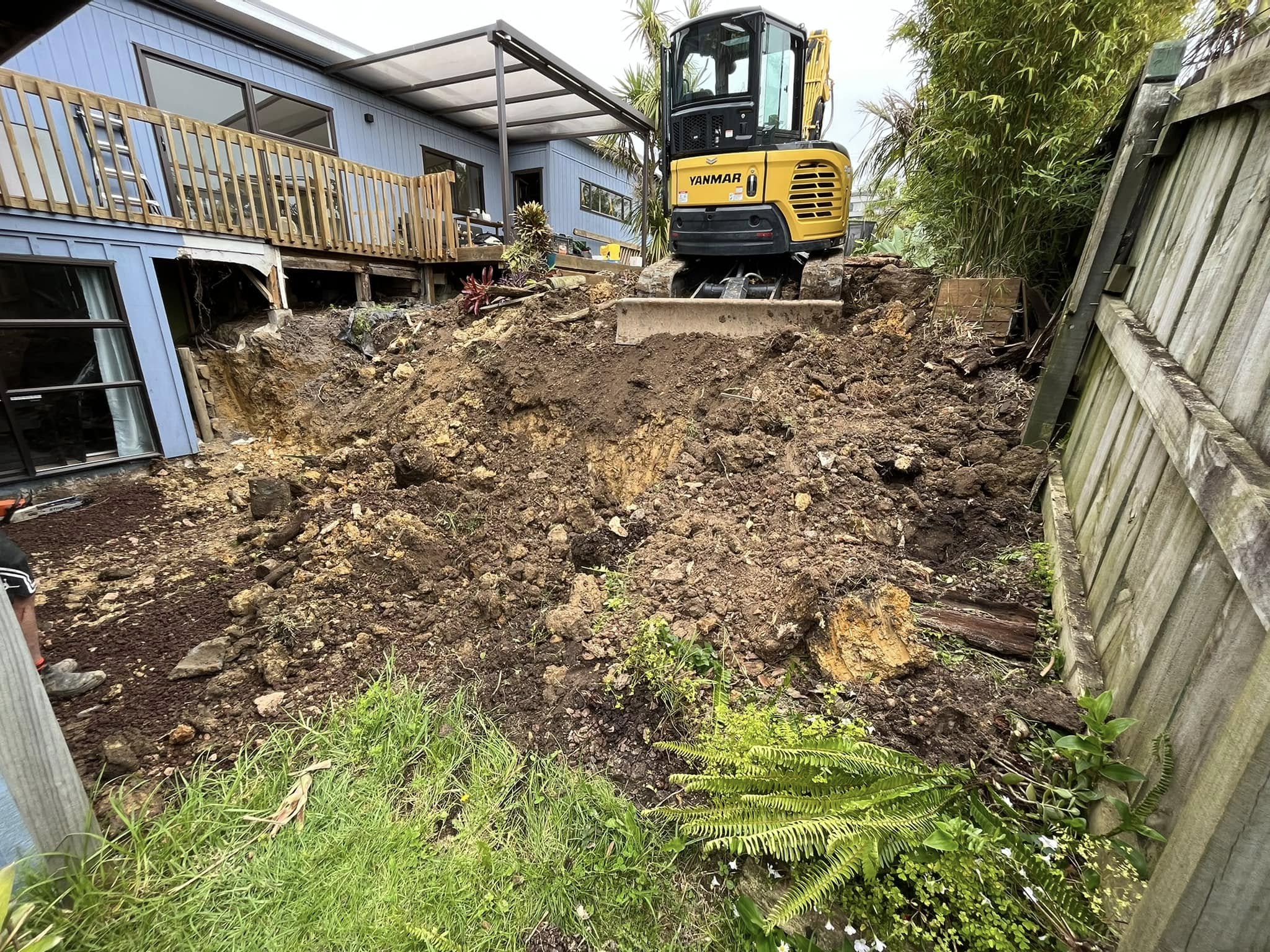 Excavator completing residential earthworks and site preparation